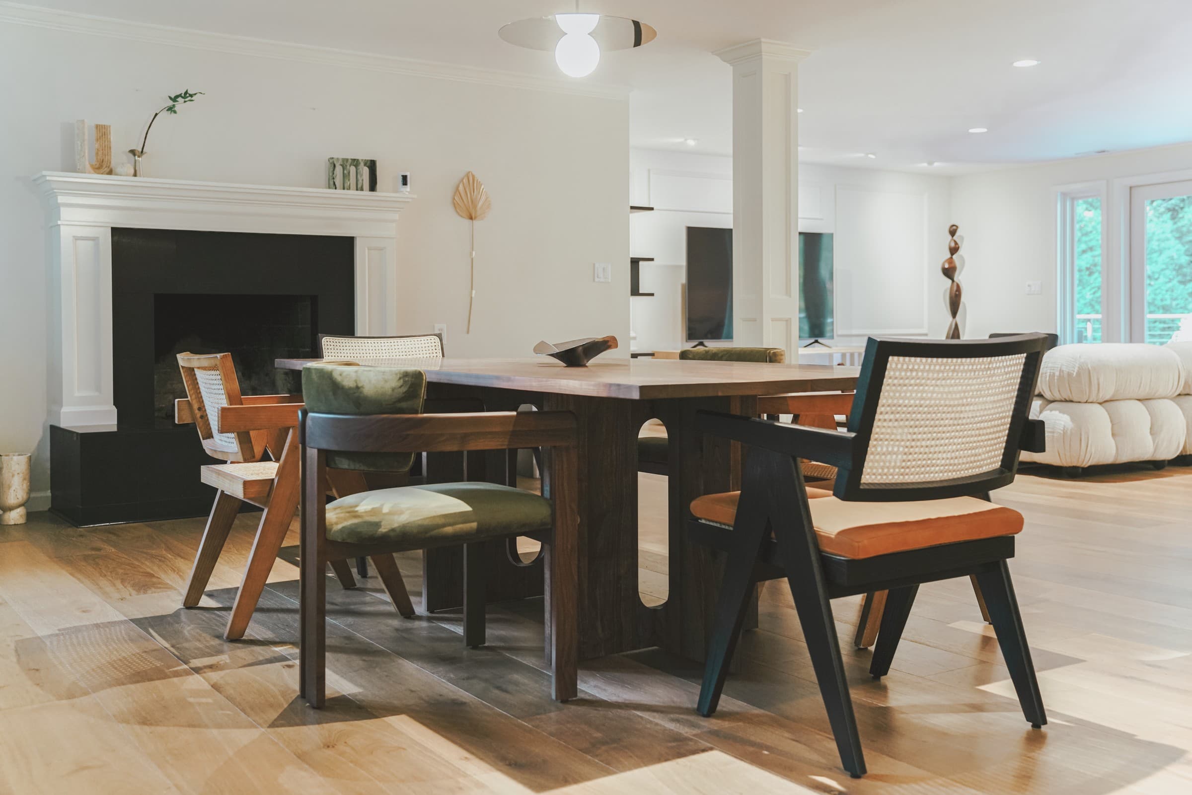 Warm timber dining setting in the open-plan Medina House